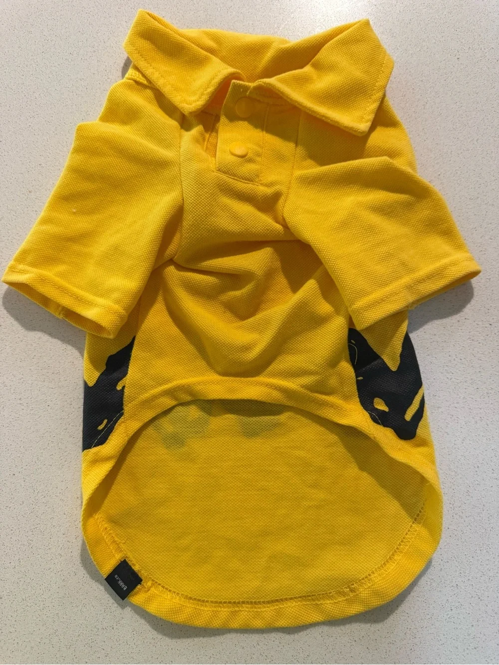 Small dog charlie brown polo bark brand